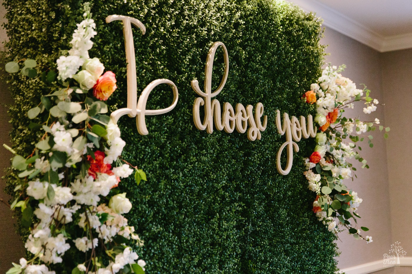 I choose you floral wall for gay wedding ceremony inside Renaissance Concourse Atlanta Airport hotel.