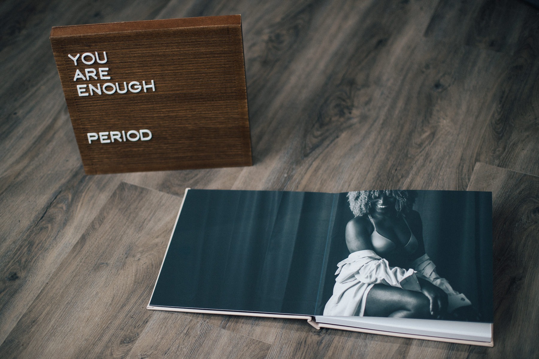 You Are Enough Period Love Yourself leather album opened to reveal a full spread of a black and white boudoir image 12x24 inches