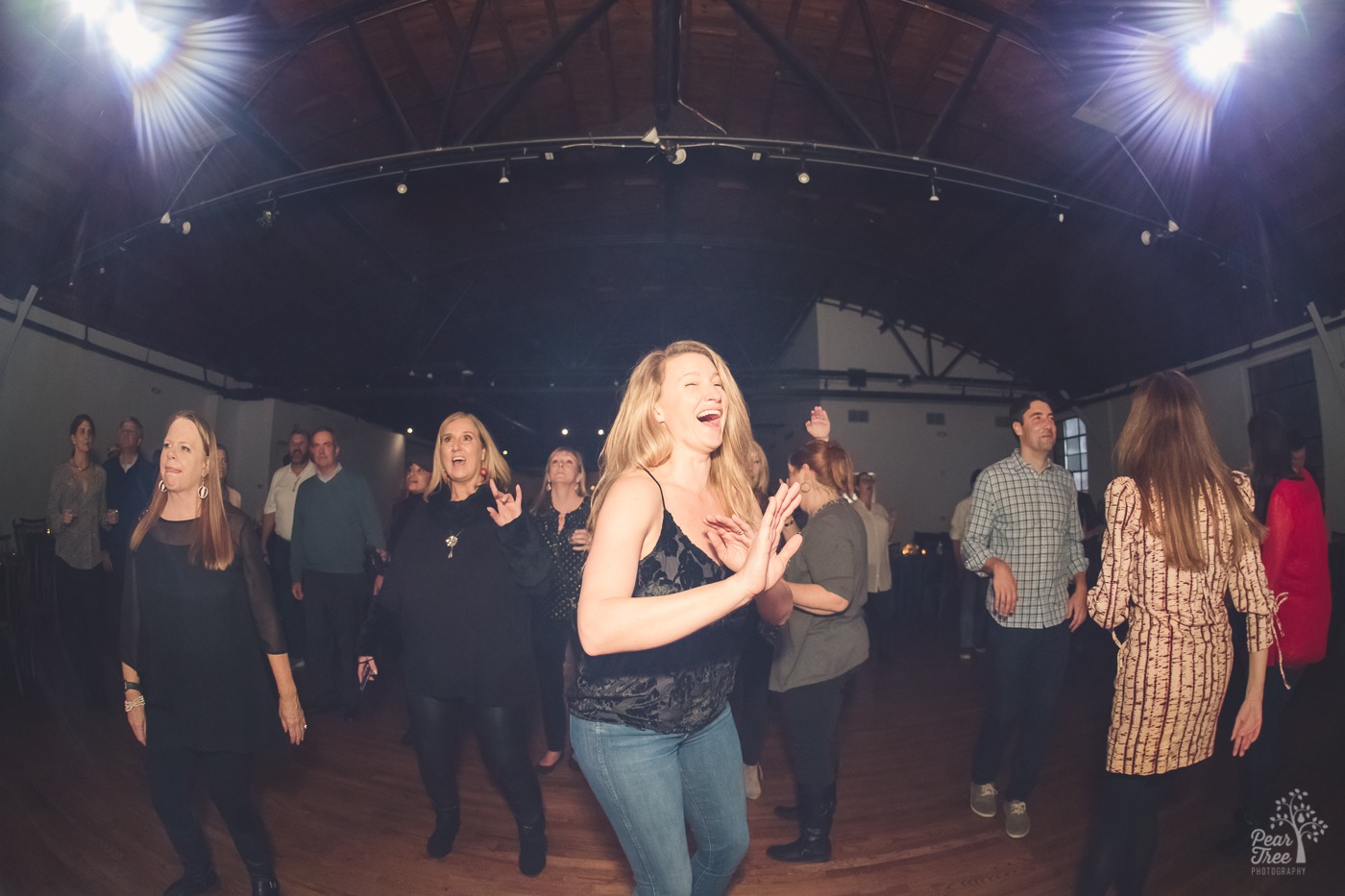 Guests dancing and singing along with Yacht Rock Review Band performing for Covenant House Georgia guests at their twenty one year celebration.