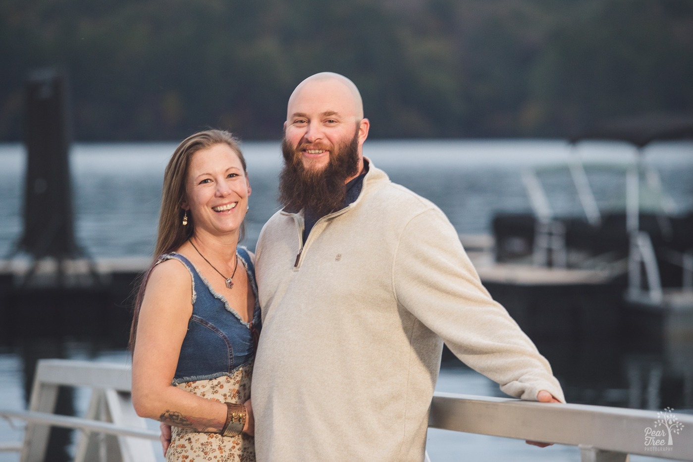 Happy couple standing together and smiling at the camera at Lake Arrowhead