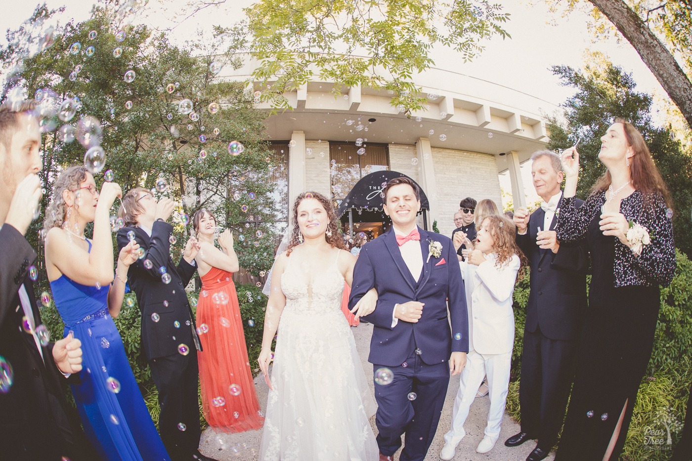 A bubble serenade for Atlanta wedding couple Nick + Katarina as they leave The Atrium