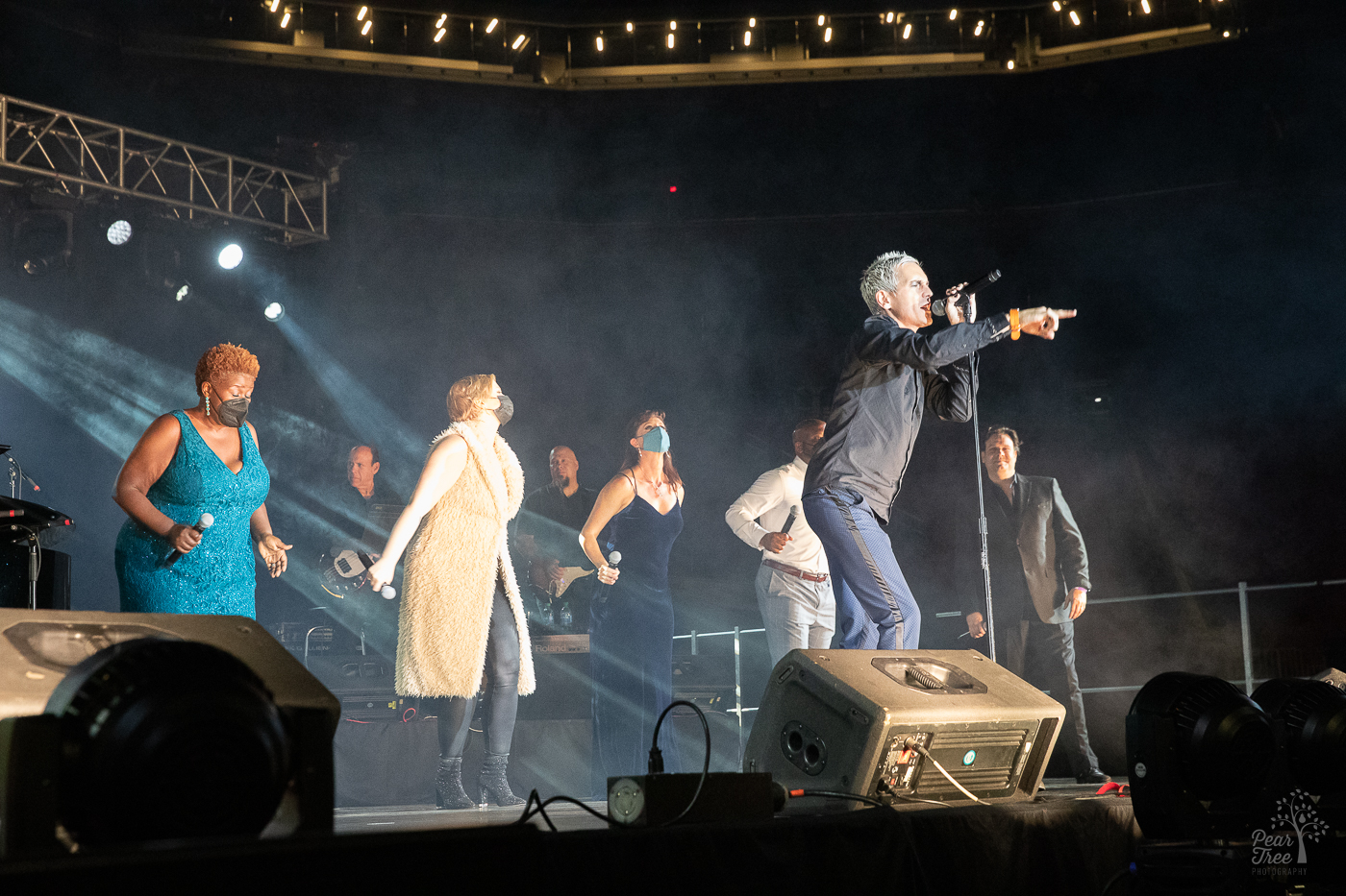 Broadway stars performing live on stage at Mercedes Benz stadium with some wearing masks