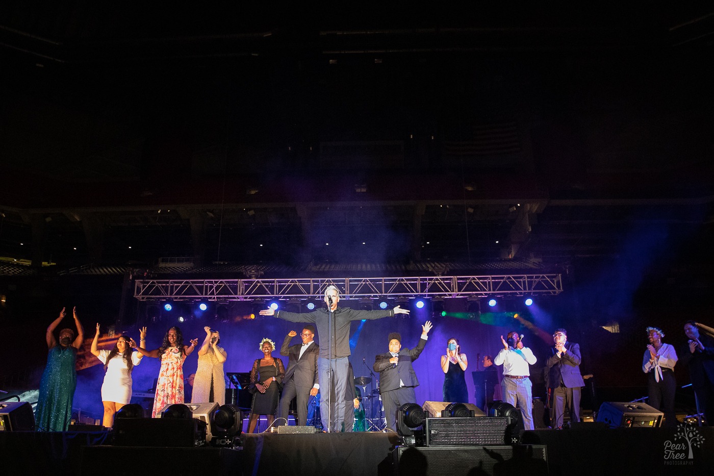 Covenant House Georgia youth on stage with broadway performers at Mercedes Benz stadium in Atlanta