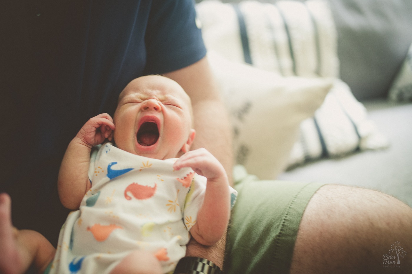 Yawning newborn baby boy