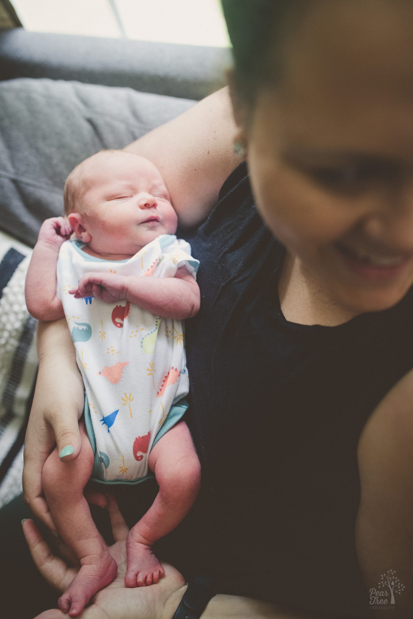 Little legs and feet being shown off during a newborn photography session