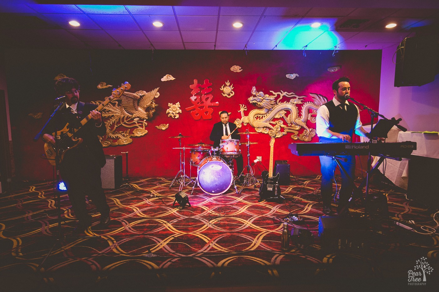 Atlanta Wedding Band performing on stage at Canton House for an Asian wedding reception