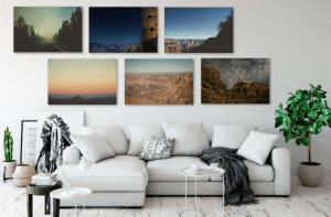 Six fine art wall pieces of images of the Grand Canyon and Zion National park displayed above a couch