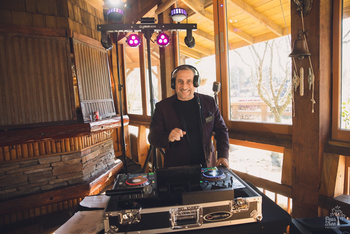 Lou Guzzo behind Spectrum Entertainment DJ set up at Rocky's Lake Estate wedding reception
