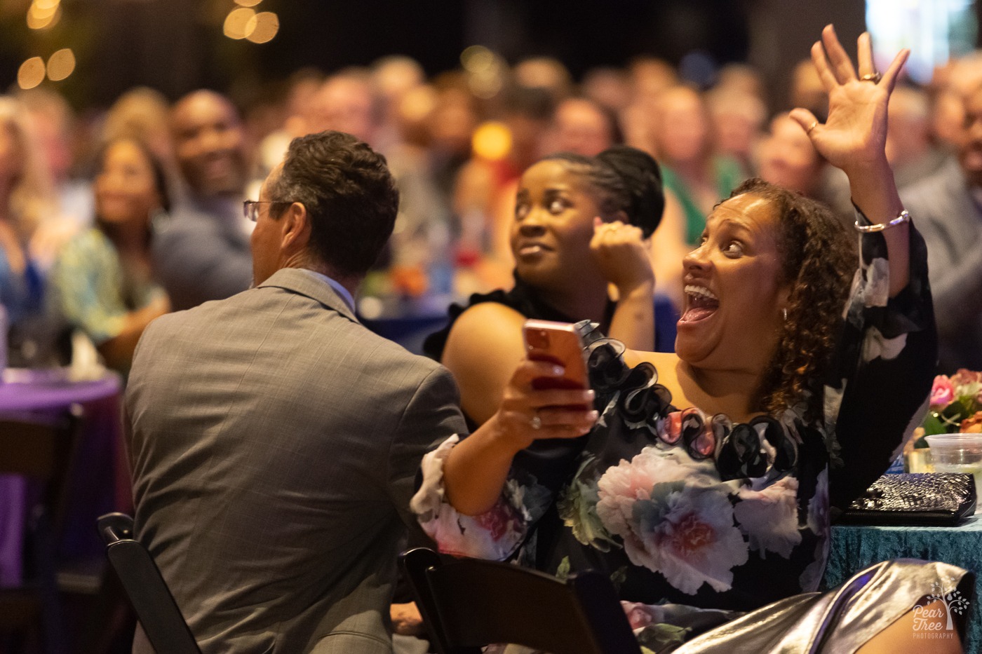 Night of Broadway Stars cheering enthusiastically during Bid Dawg Auction for a puppy