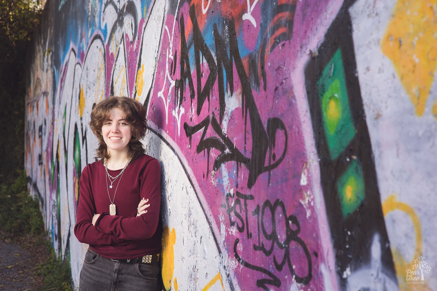 Little Five Poiints high school senior session against graffiti wall