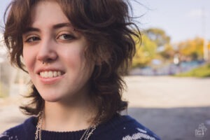 High school senior smiling at the camera