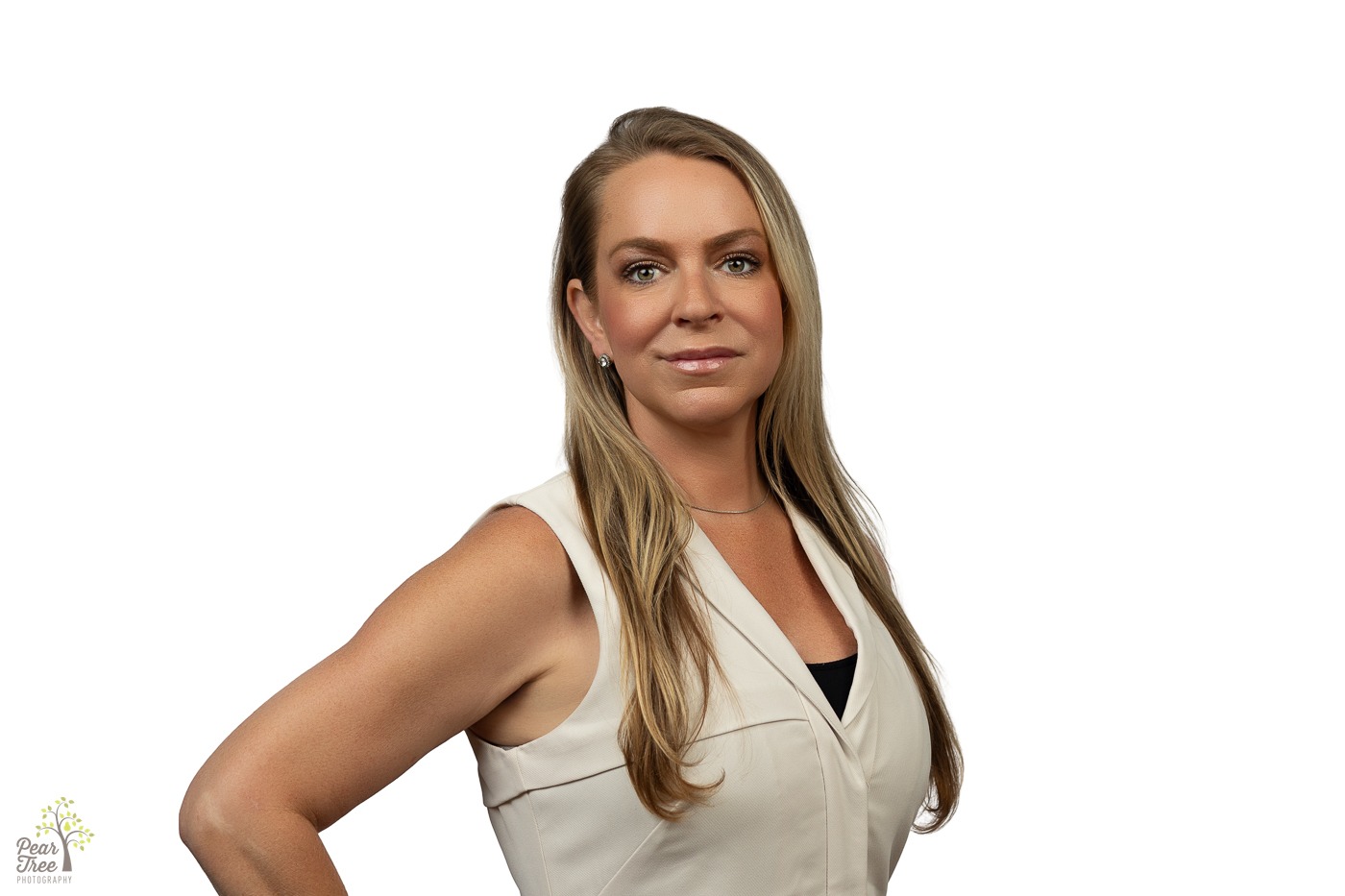 Woman with long blonde hair smiling faintly for a professional headshot with a white background in Canton, GA