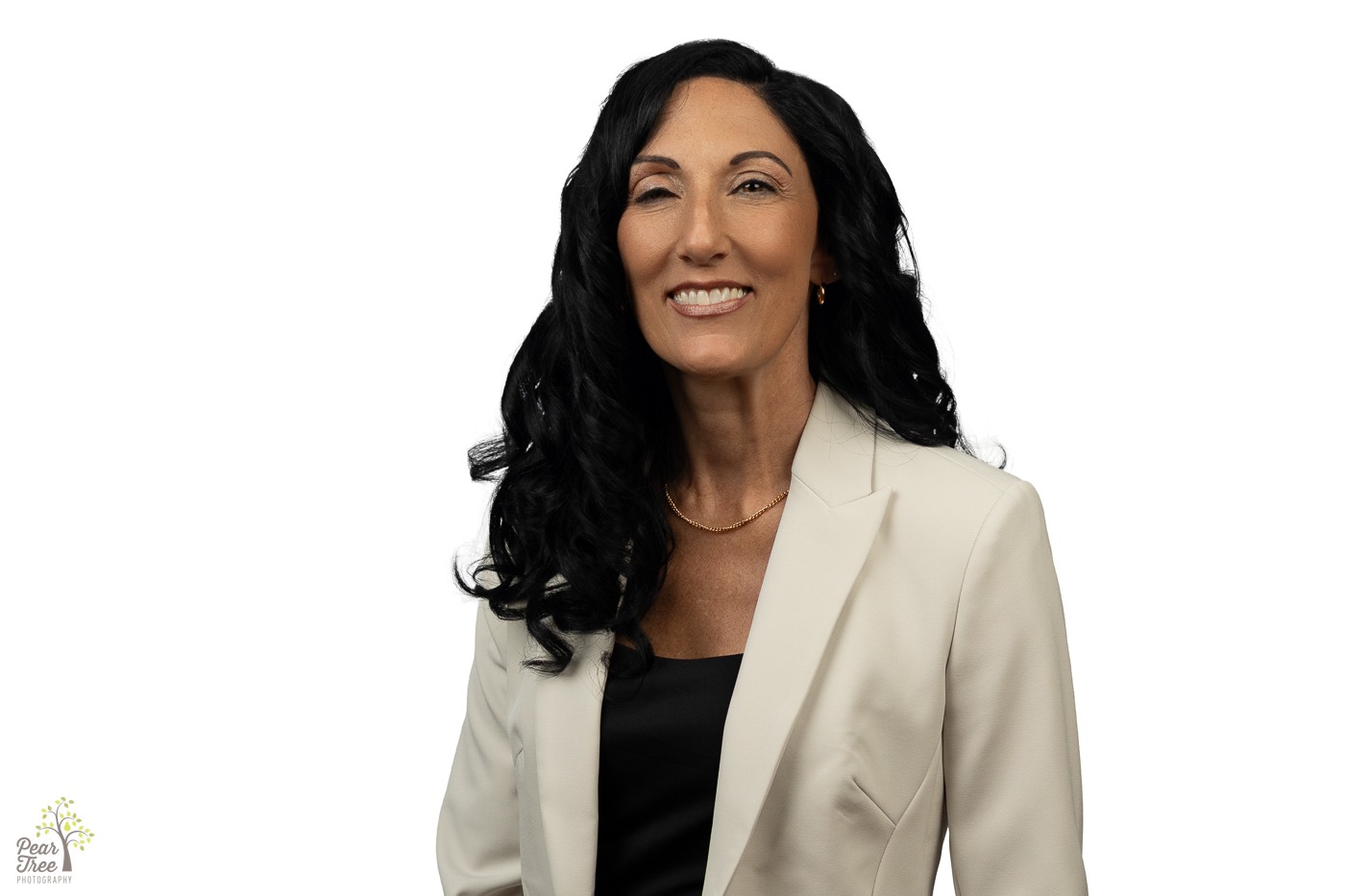 Local State Farm agent in Canton wearing a bone blazer and black blouse