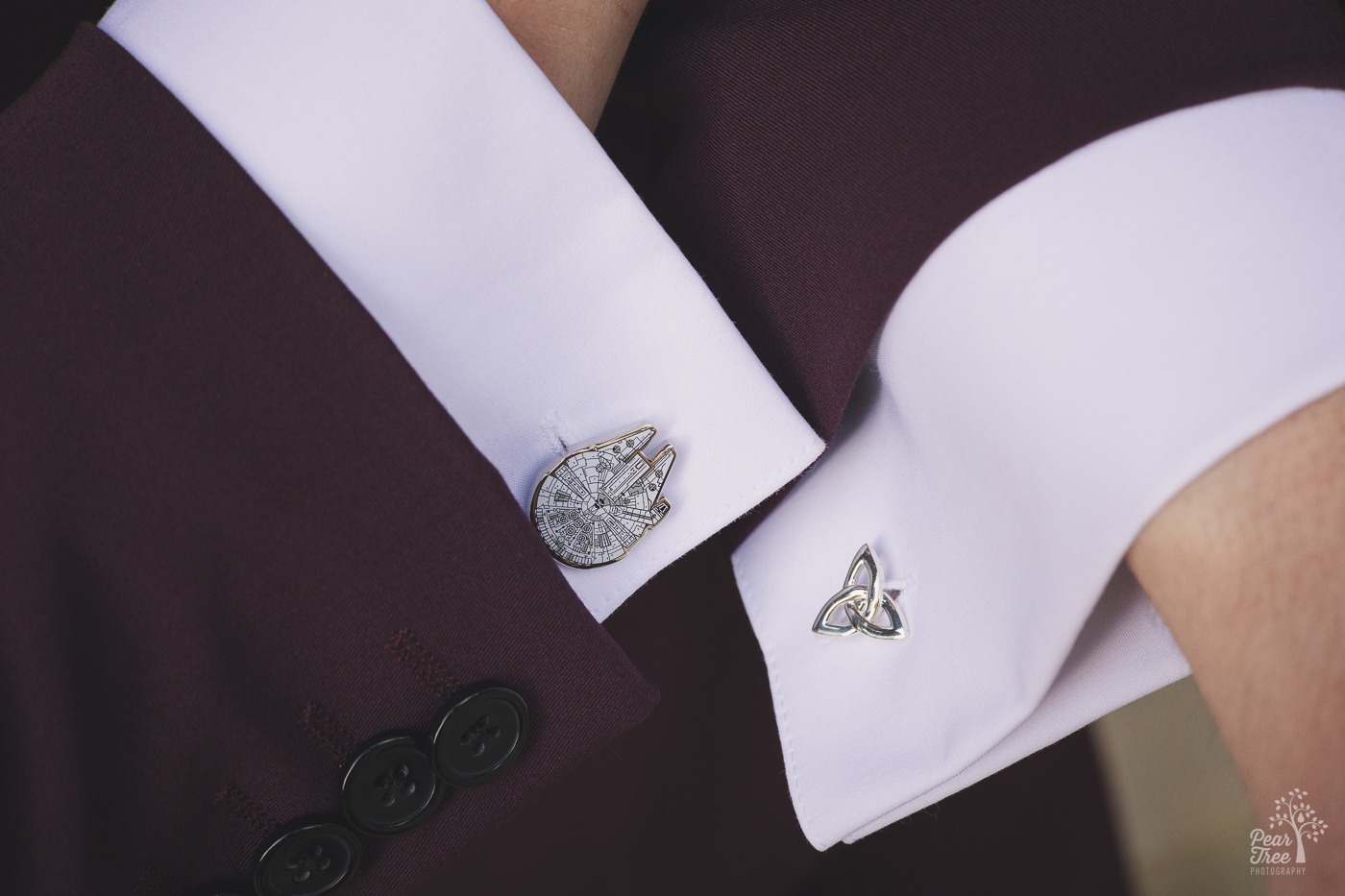 Special Star Wars cufflinks on grooms' wrists