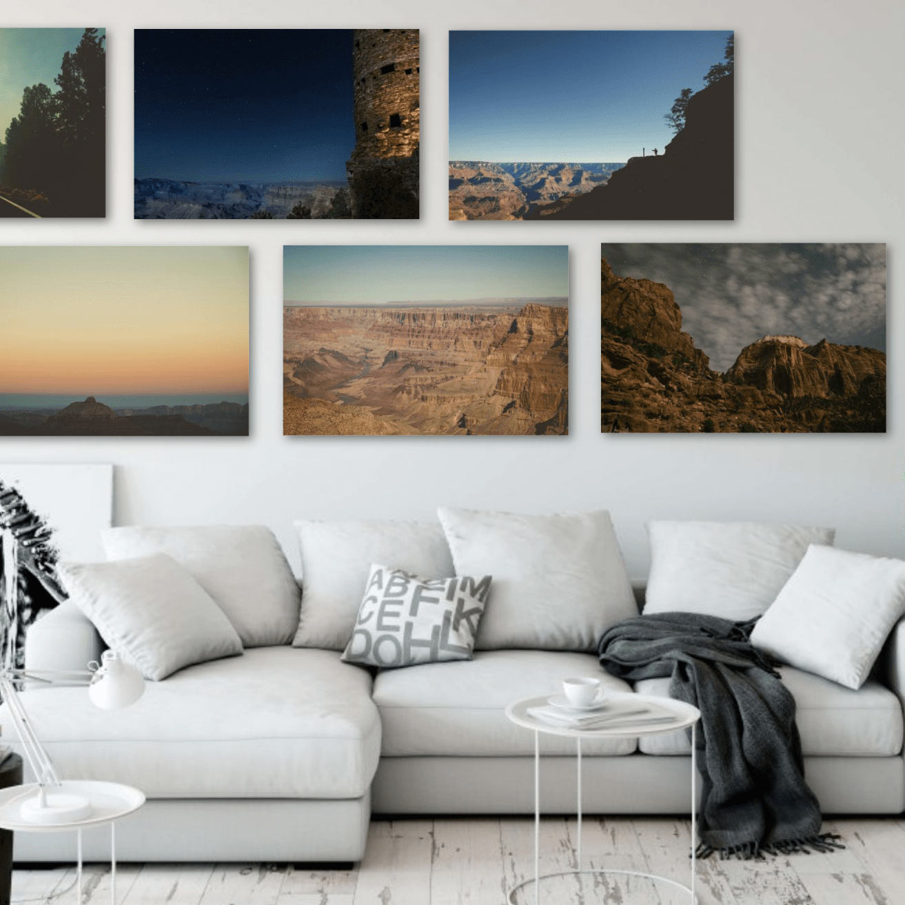 Six fine art wall pieces of images of the Grand Canyon and Zion National park displayed above a couch