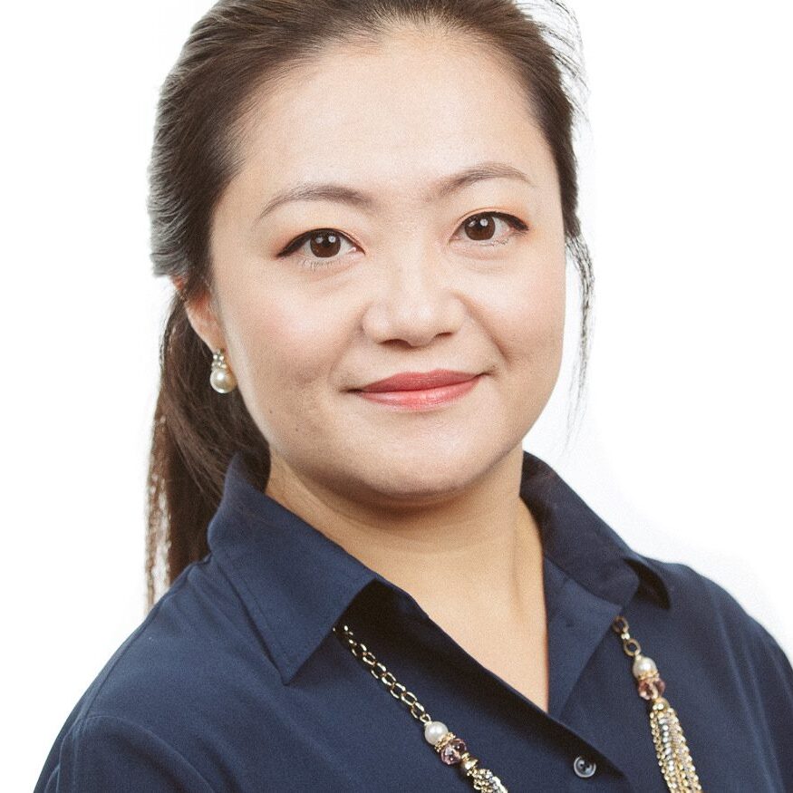 Headshot of a smiling asian woman