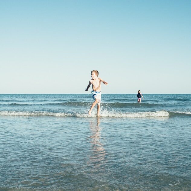 Kids jumping waves in Hilton Head