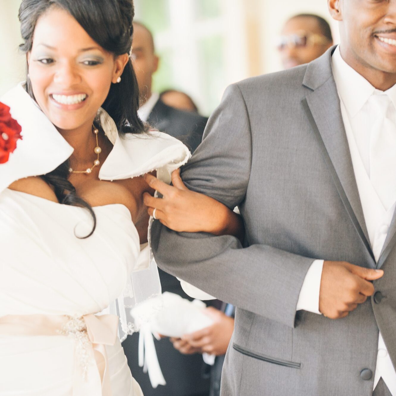 African American bride and groom happily walking back down the aisle after their Atlanta wedding at the Piedmont Room